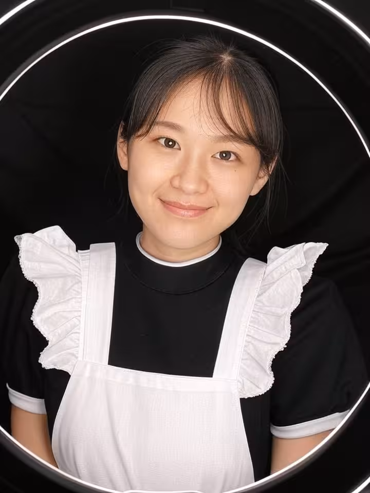 Professional cosplay photography setup on budget, ring light illuminating girl in maid costume, smar
